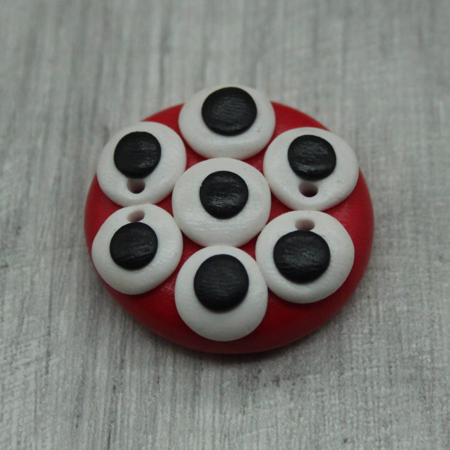 Alien eyes polymer clay button