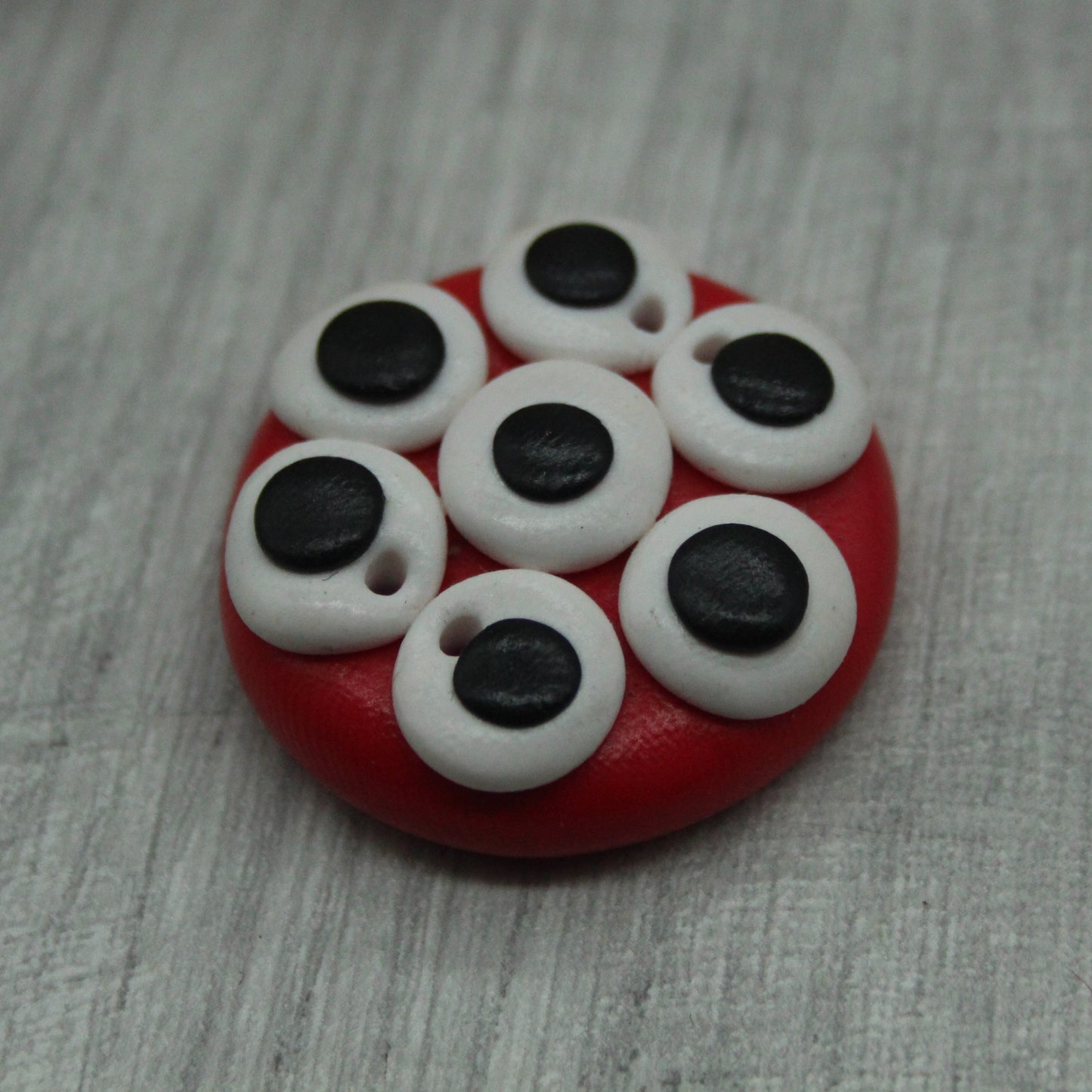 Alien eyes polymer clay button
