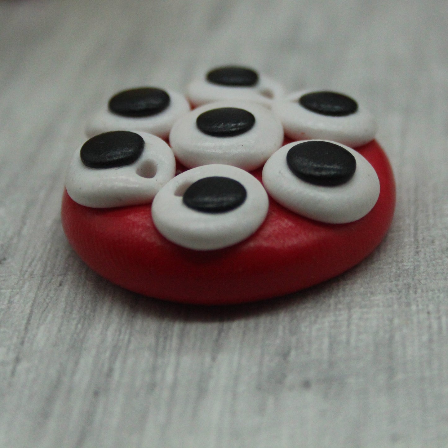 Alien eyes polymer clay button