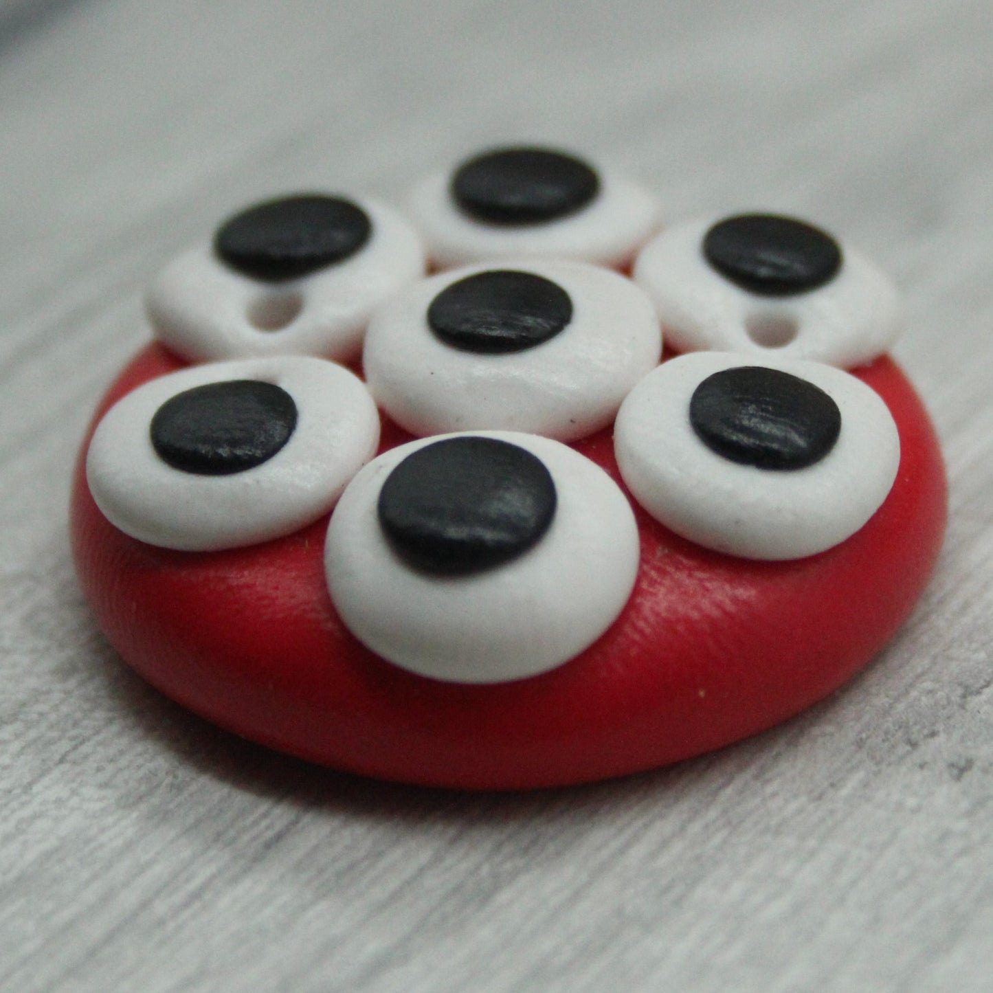 Alien eyes polymer clay button