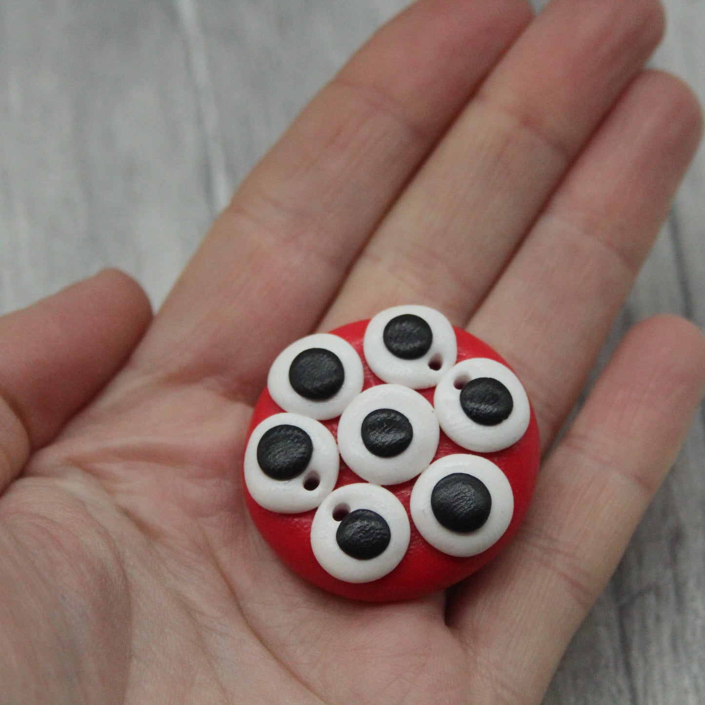 Alien eyes polymer clay button
