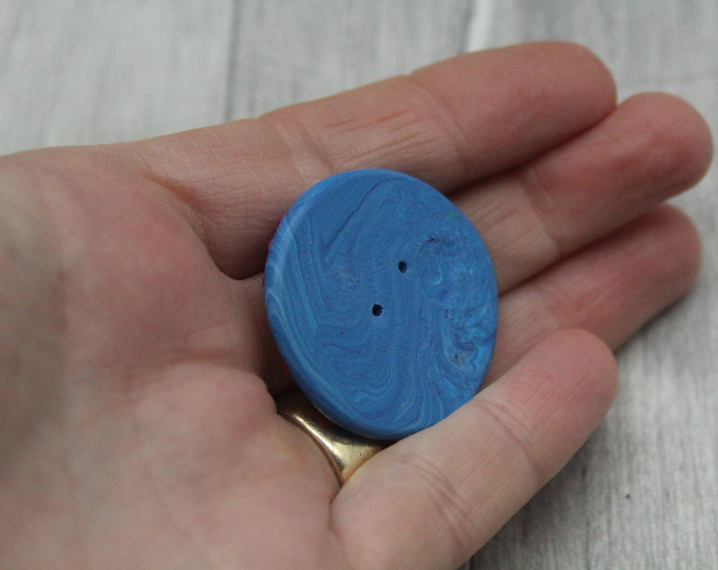 Fish polymer clay button