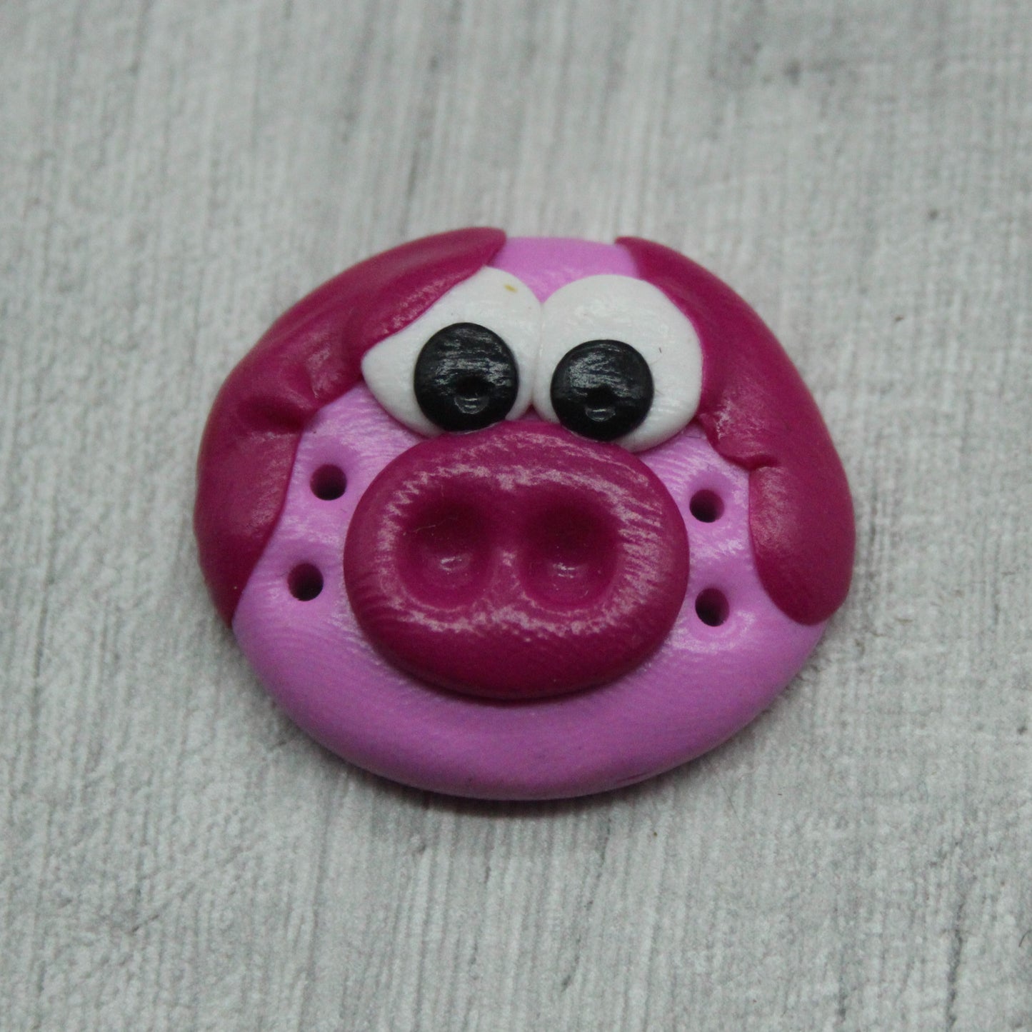 Pig face polymer clay button