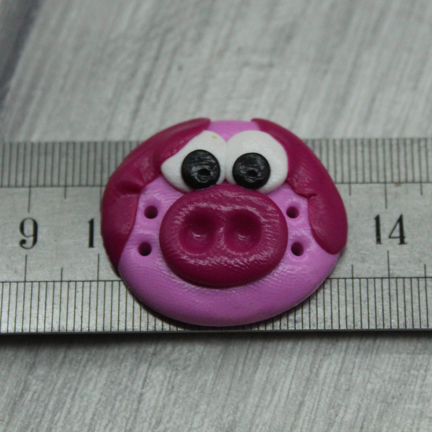 Pig face polymer clay button