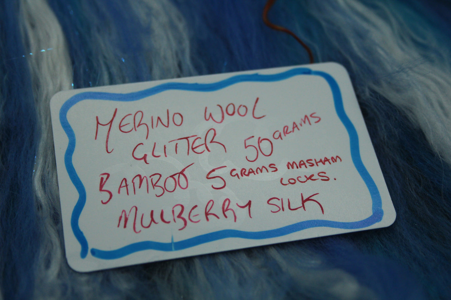 Merino Art Batt  - Black Blue  -  50 grams 1.7 oz - 5 grams of locks - Wool for felting, spinning and weaving