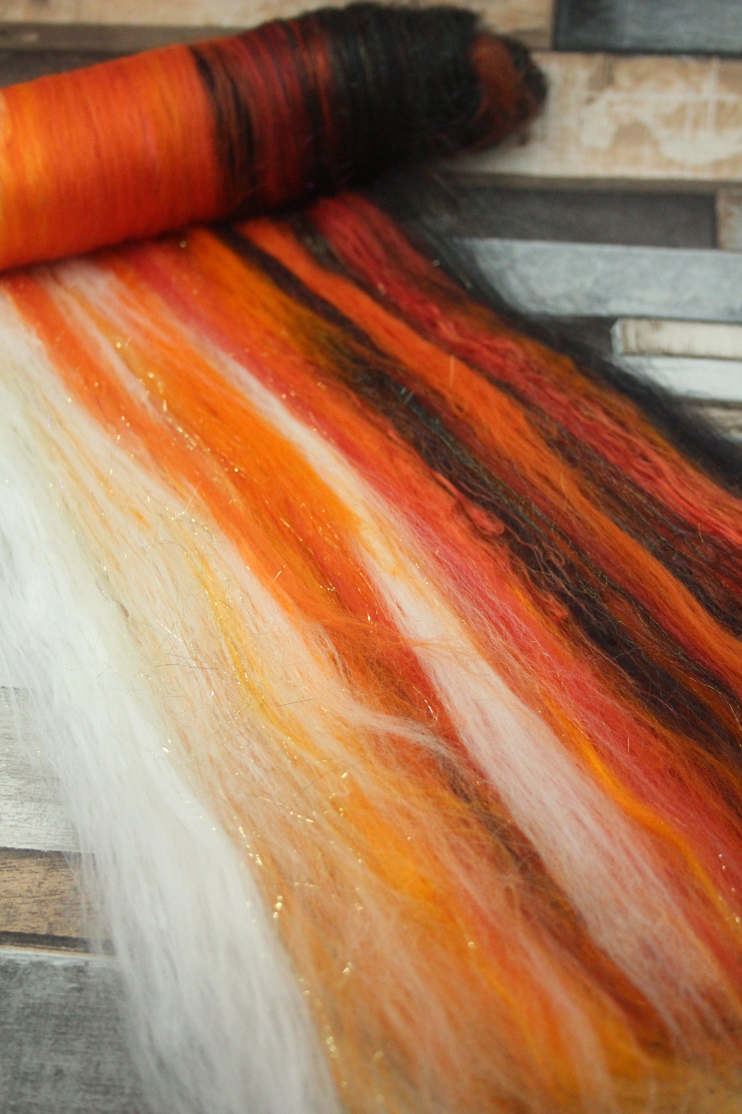 Merino Art Batt  - Black Orange White - 41 grams 1.4 oz - Wool for felting, spinning and weaving