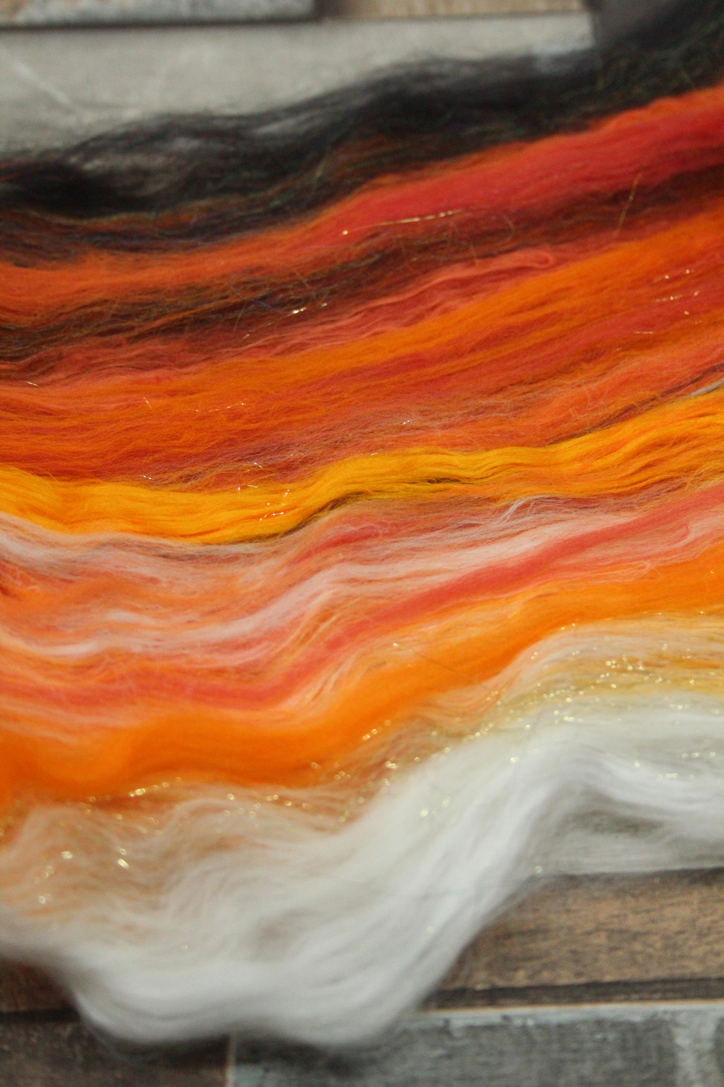 Merino Art Batt  - Black Orange White - 41 grams 1.4 oz - Wool for felting, spinning and weaving