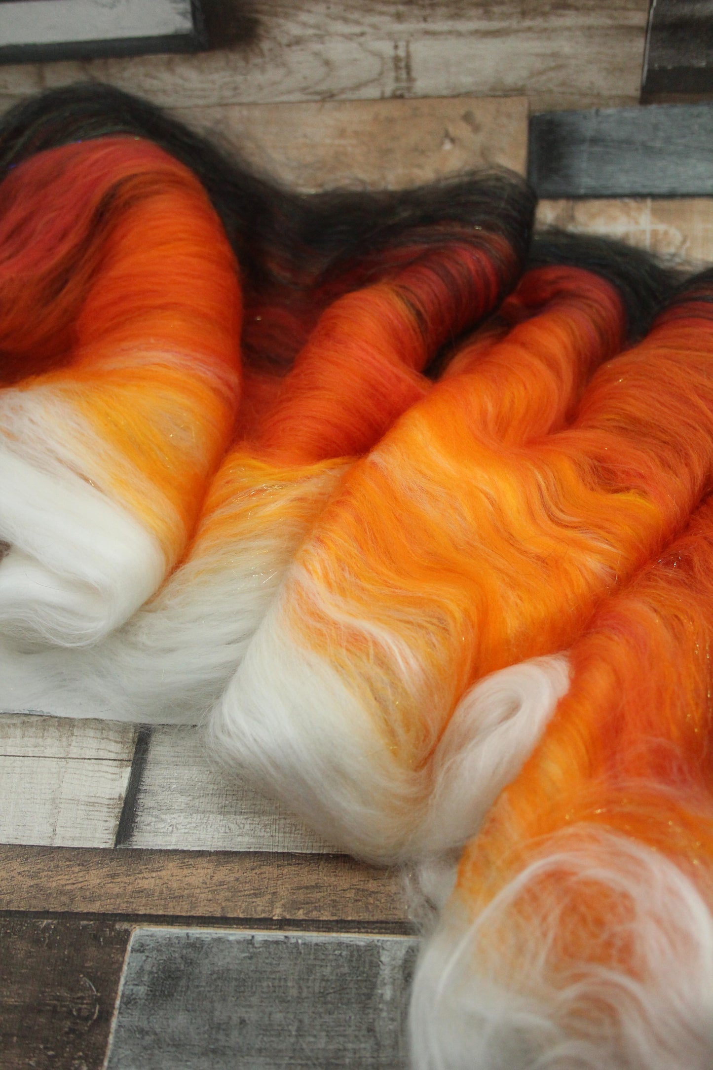 Merino Art Batt  - Black Orange White - 41 grams 1.4 oz - Wool for felting, spinning and weaving