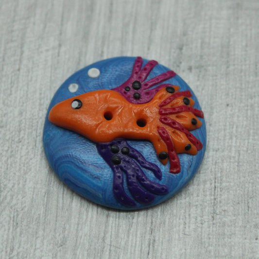 Fish polymer clay button