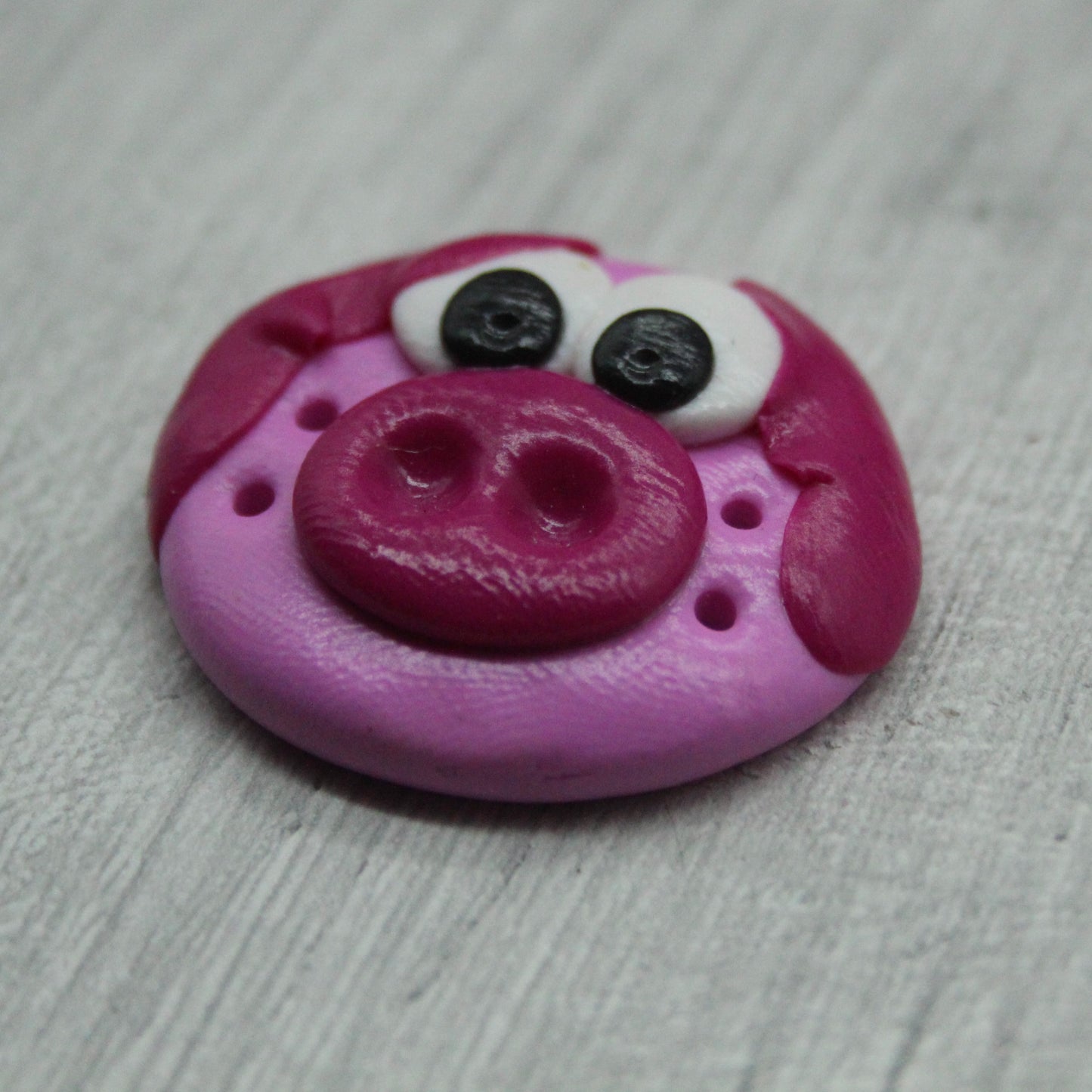 Pig face polymer clay button
