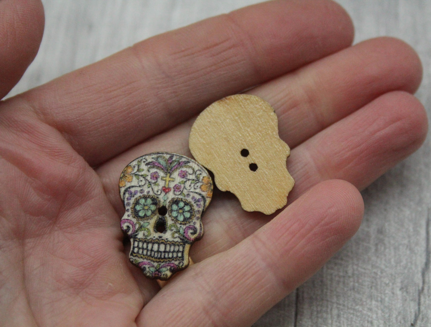 2 x Wooden skull buttons